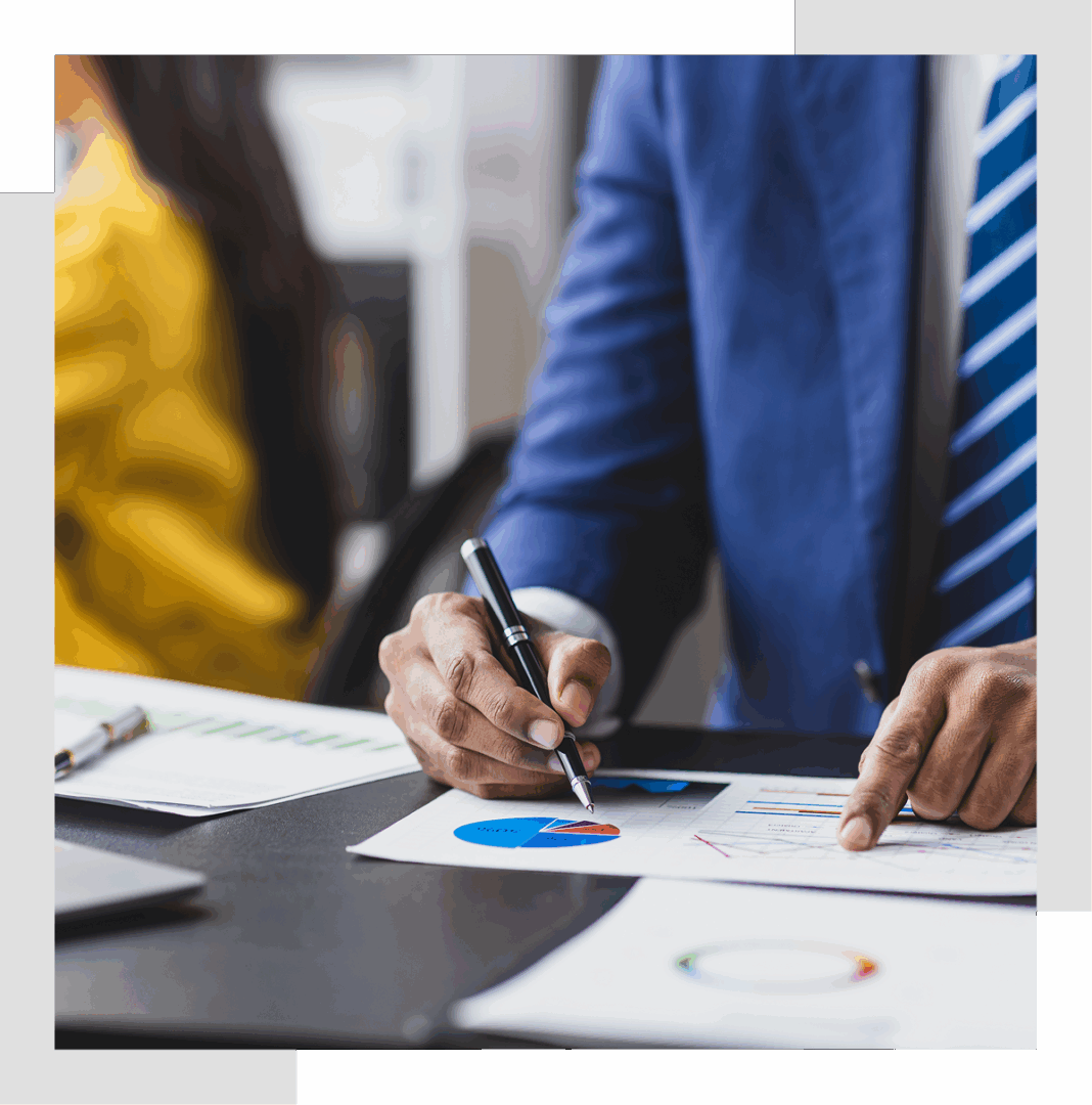 Businessman analyzing charts in a meeting.