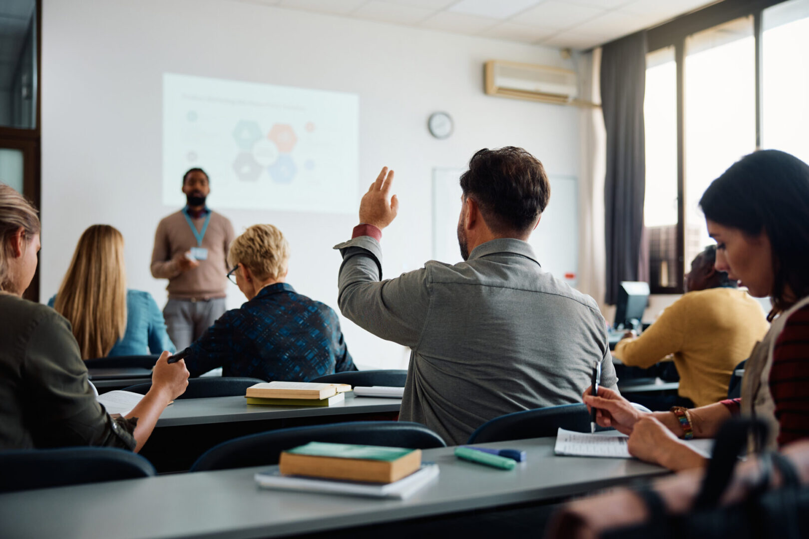 Classroom with students and a presenter.